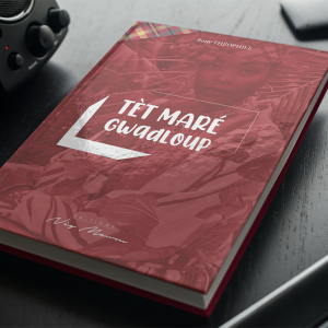 mockup-of-a-hard-cover-book-on-a-table-with-gadgets-3407-el1